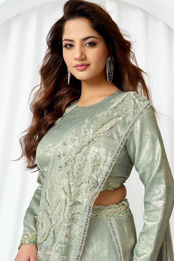 Green Metallic Lustrous Satin Silk Leaf Motifs Embellished Lehenga Saree